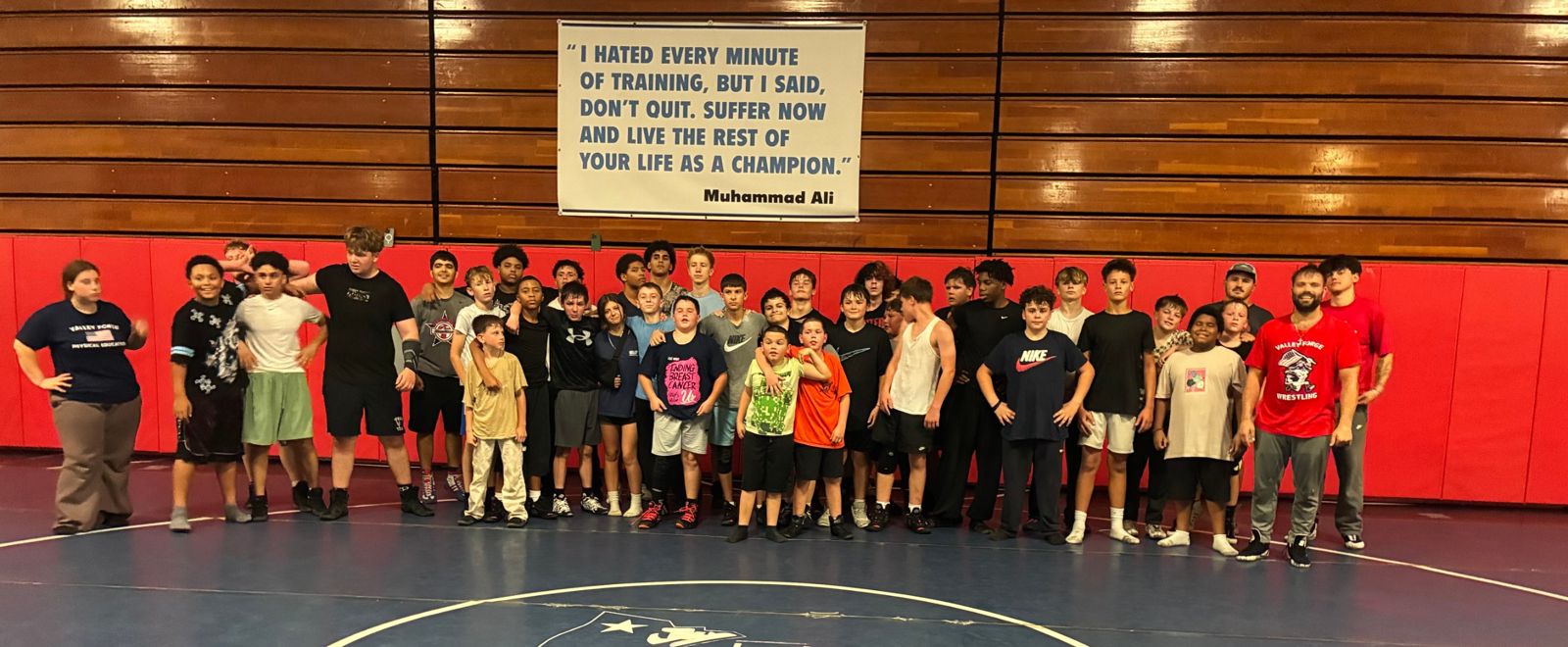 Valley Forge Wrestling Club wrestlers and coaches in the Valley Forge High School wrestling room in Parma Heights, Ohio